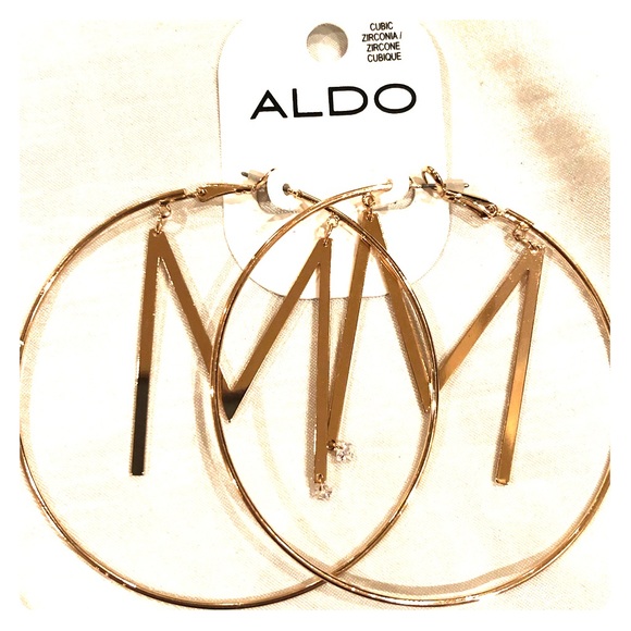 Gold brand new earrings